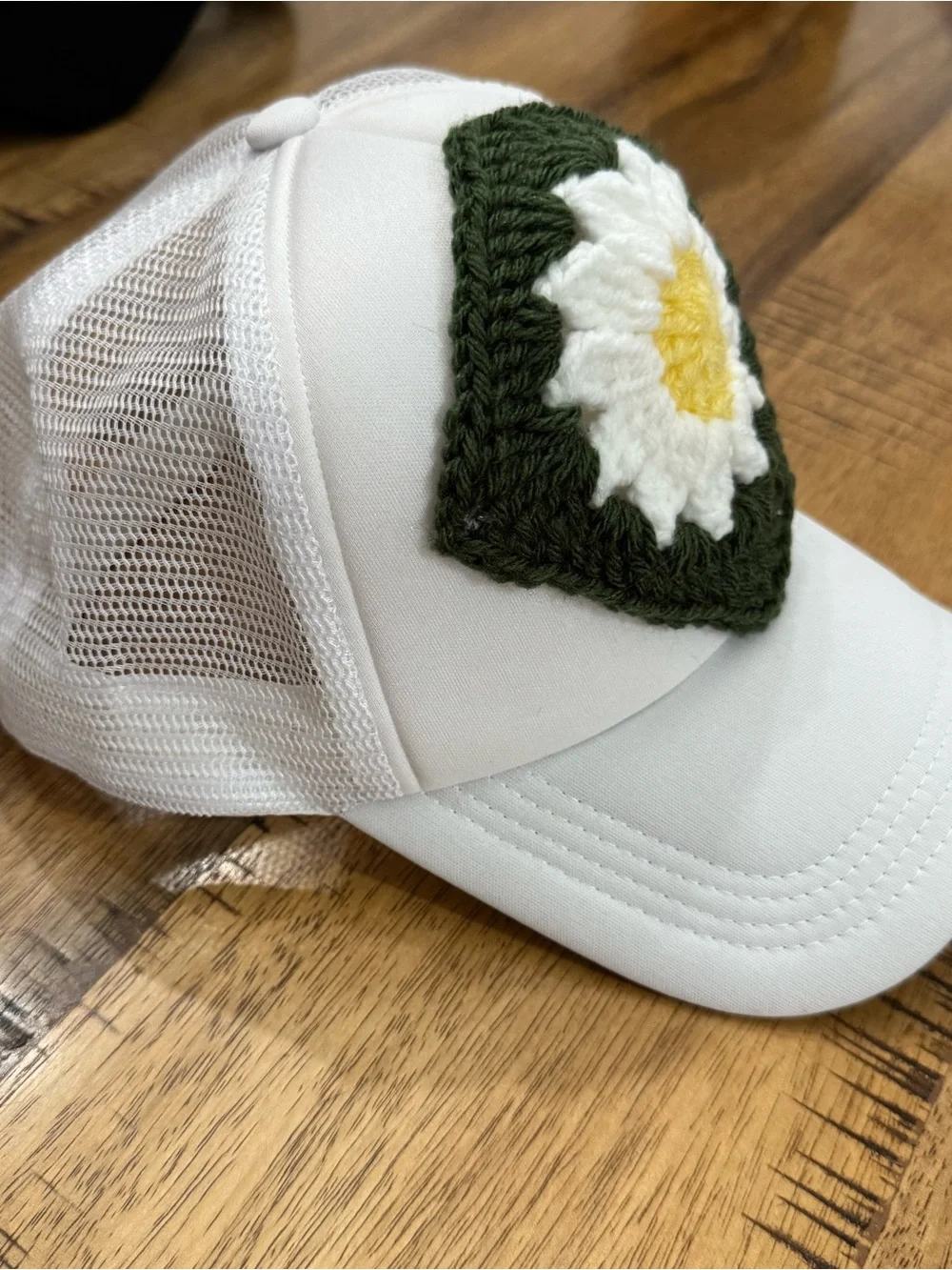 White Trucker Hat with Green Crochet Daisy Patch